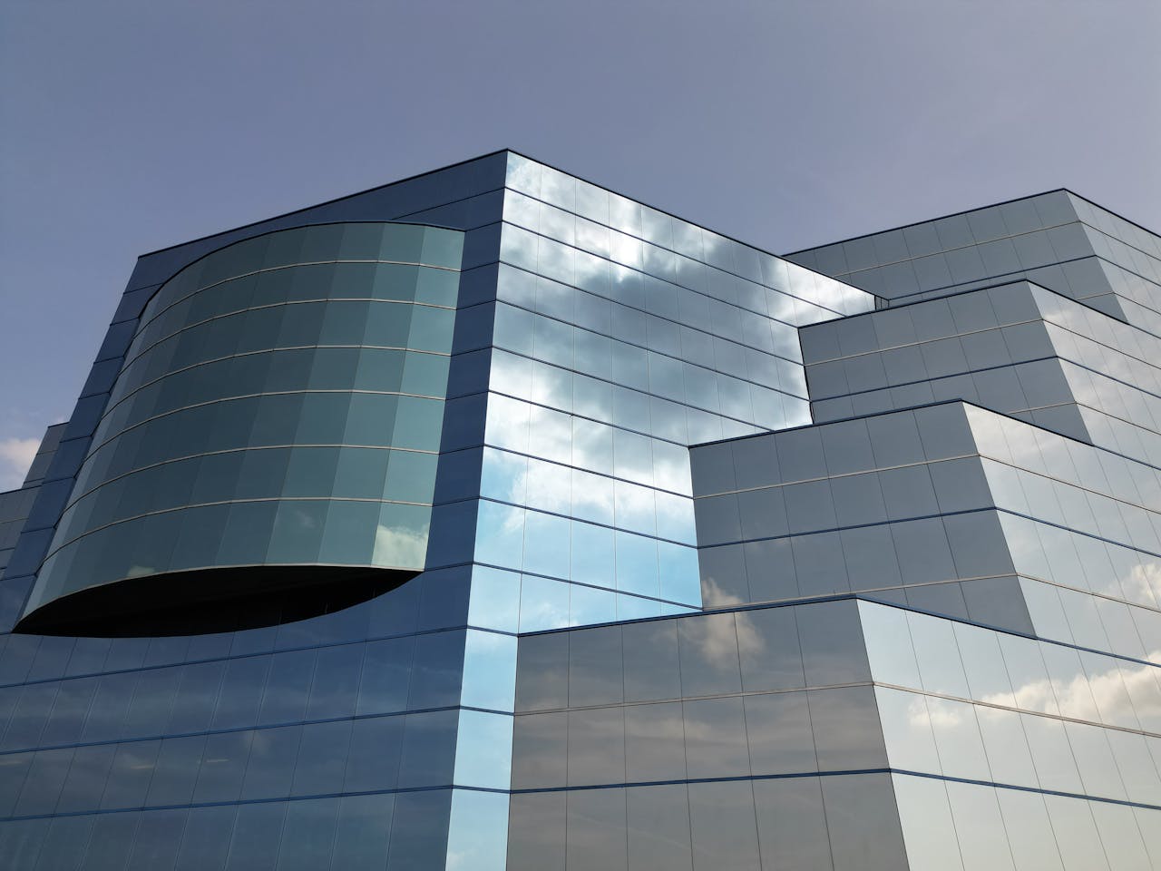 Stunning modern architecture featuring a reflective glass exterior located in Plymouth, Minnesota.